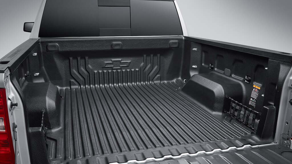 Bed liner con compartimentos para proteger el área de carga de tu Chevrolet Silverado Turbo 2025, camioneta de trabajo